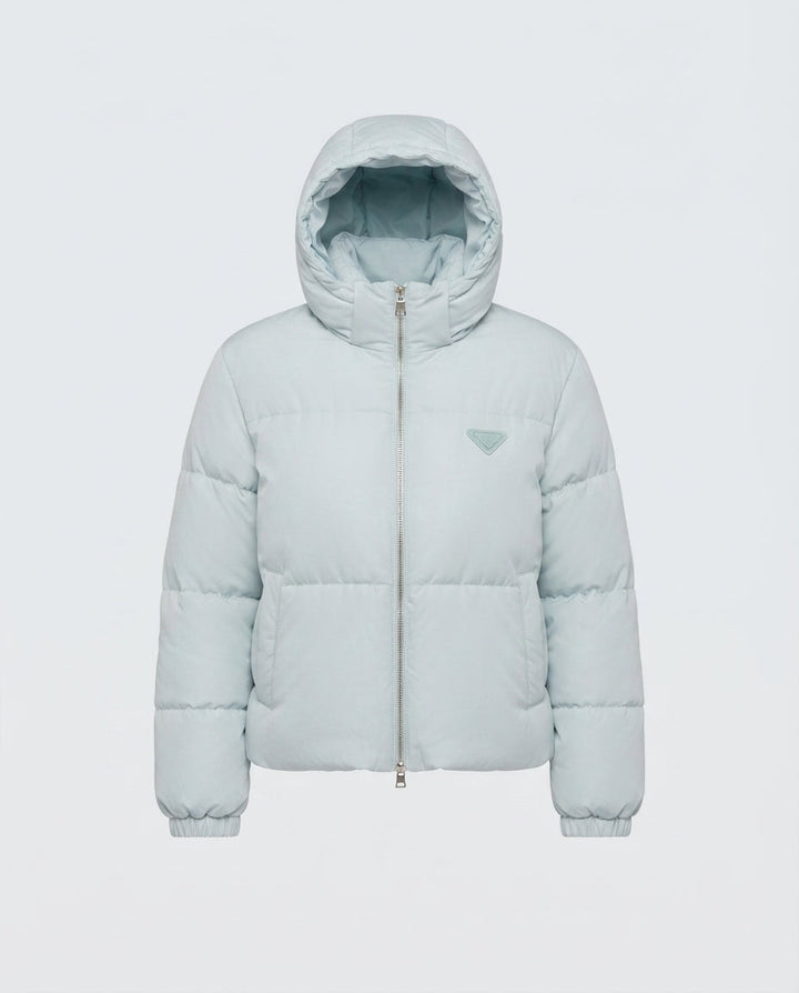 Women's short quilted boxy puffer with hood, adjustable hem and elastic cuffs