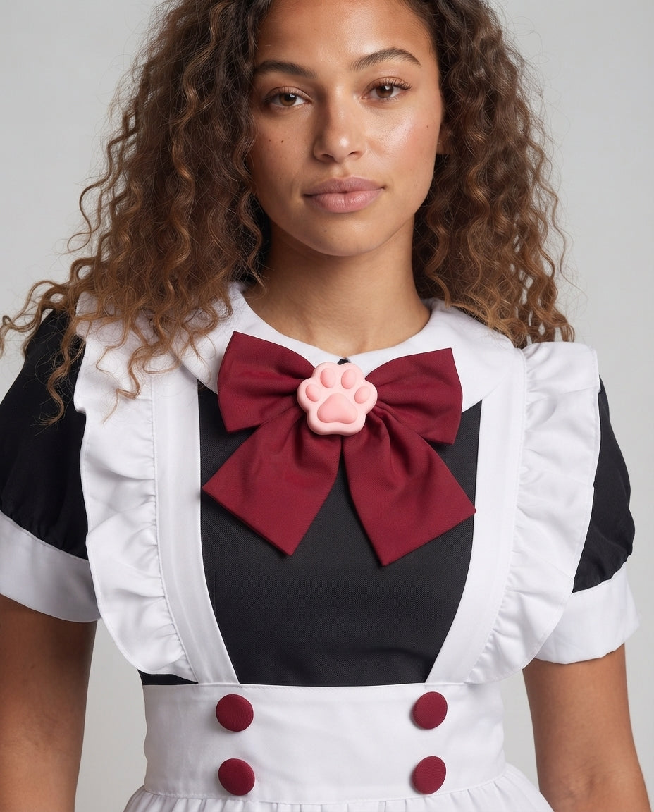 Women's playful maid dress with ruffle details and stylish bow accent Mune Fashion