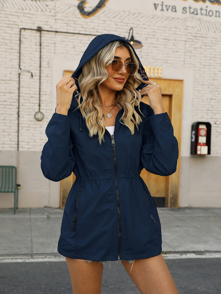 Mune | Women's rain jacket with hood and floral pattern lining