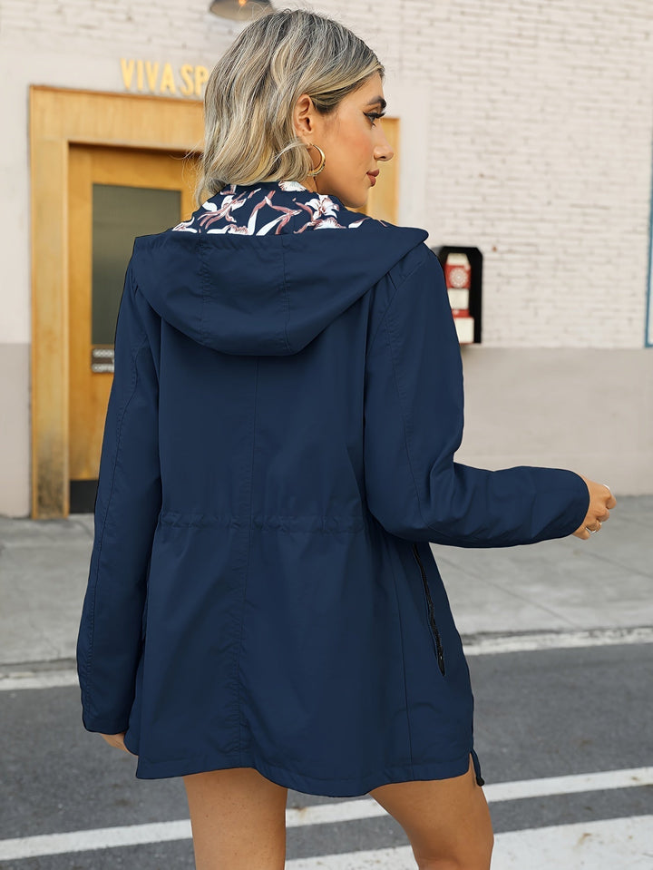 Mune | Women's rain jacket with hood and floral pattern lining