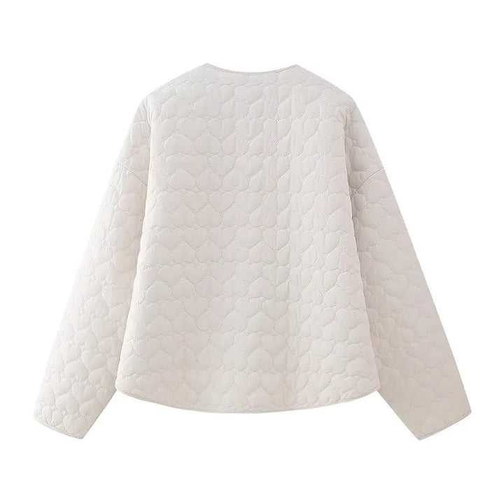 Mune | Padded vests with heart pattern