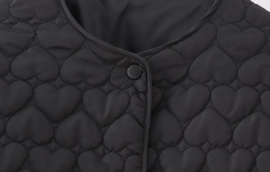 Mune | Padded vests with heart pattern
