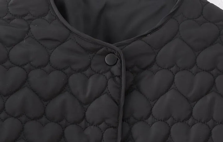 Mune | Padded vests with heart pattern