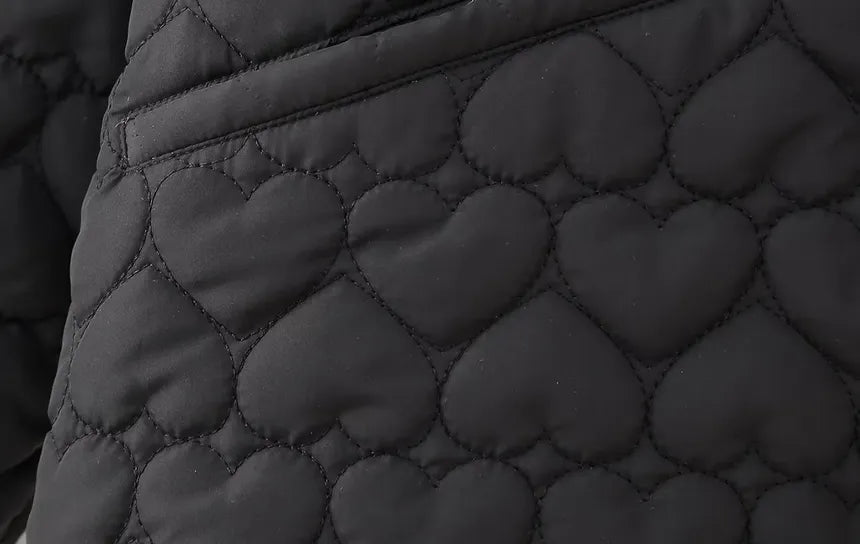Mune | Padded vests with heart pattern
