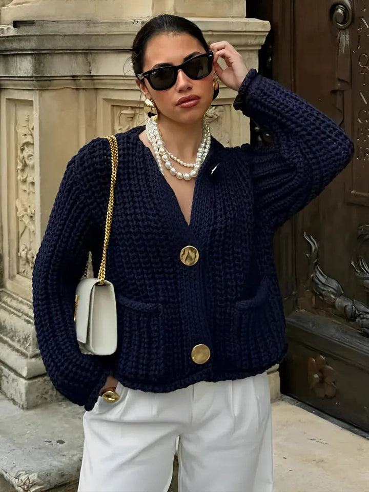 Mune | Women's knit cardigan with gold buttons and front pockets in a light design