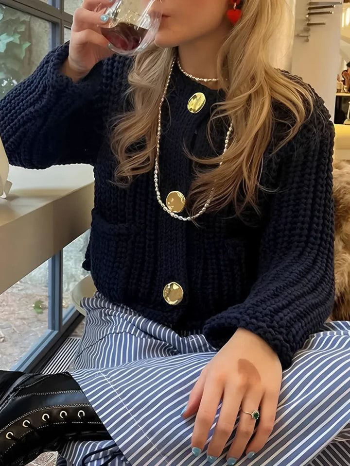 Mune | Women's knit cardigan with gold buttons and front pockets in a light design
