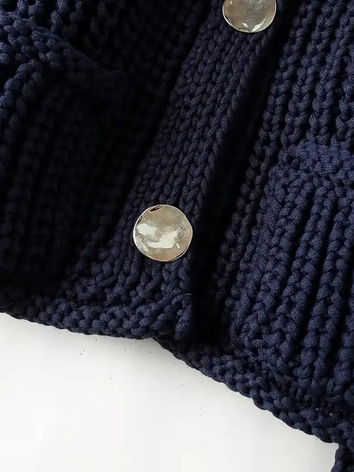 Mune | Women's knit cardigan with gold buttons and front pockets in a light design