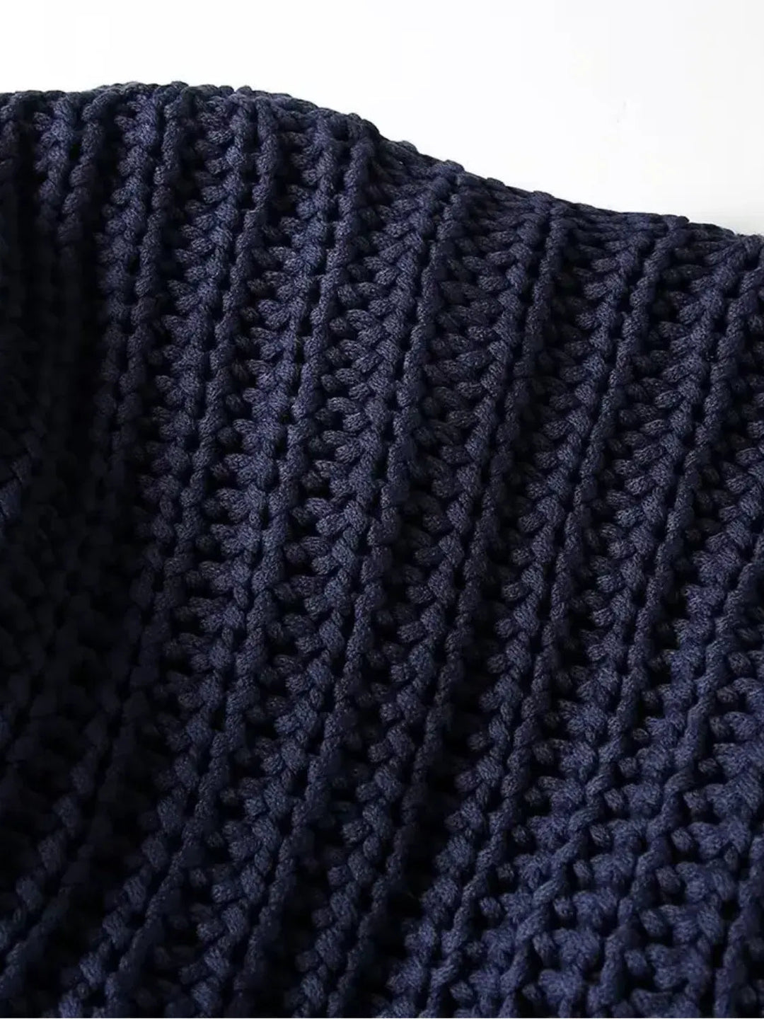 Mune | Women's knit cardigan with gold buttons and front pockets in a light design