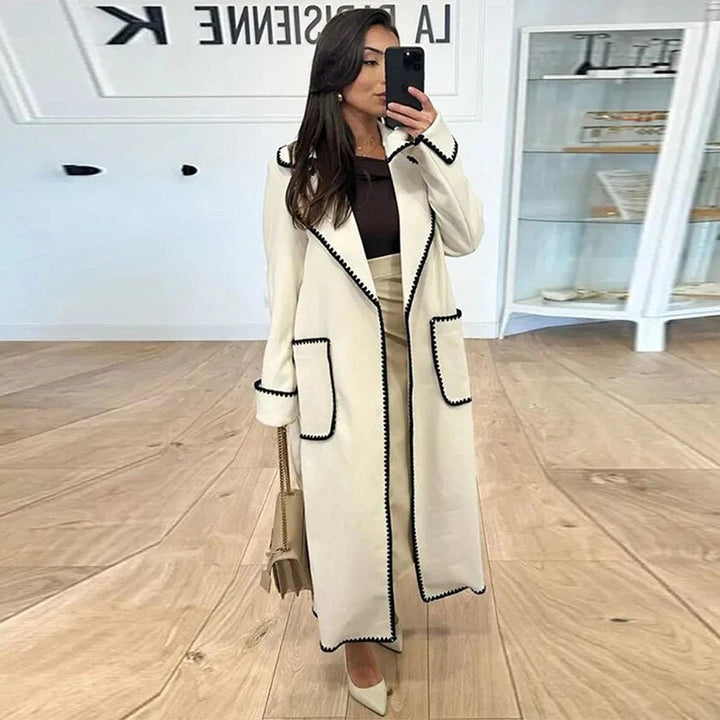 Mune | Longer women's coat with contrast seams and lapel collar