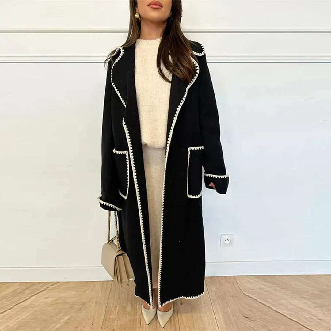 Mune | Longer women's coat with contrast seams and lapel collar