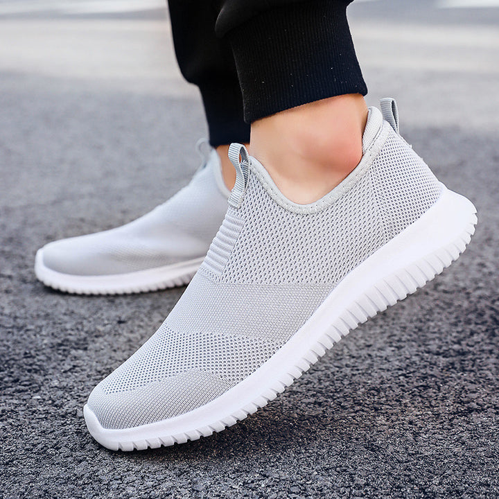 Women's minimalist slip-on leisure shoe with front pull tab, padded ankle collar, and flexible adaptive sole Mune Fashion