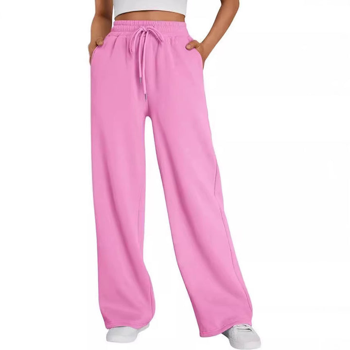 Women's wide lounge pants with high elastic waistband, adjustable drawstring and flowing palazzo silhouette Mune Fashion