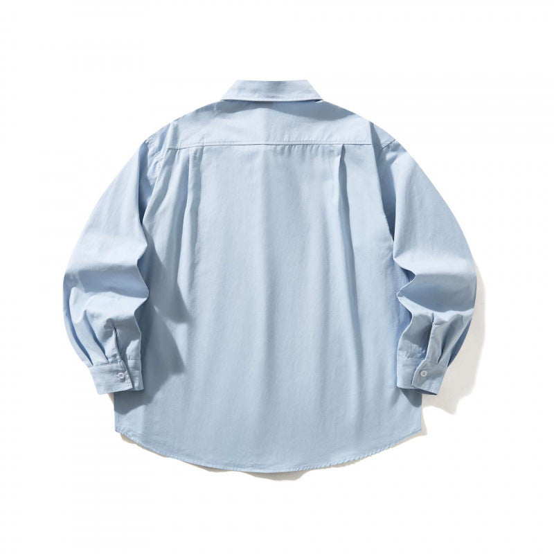 Unisex Oversized shirt with button-down collar, chest pocket and rounded hem Mune Fashion