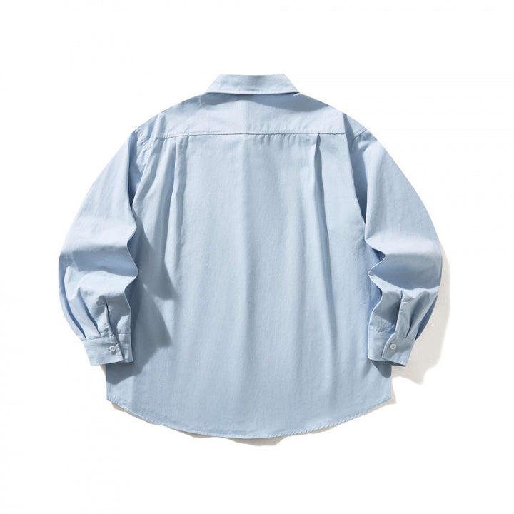 Unisex Oversized shirt with button-down collar, chest pocket and rounded hem Mune Fashion