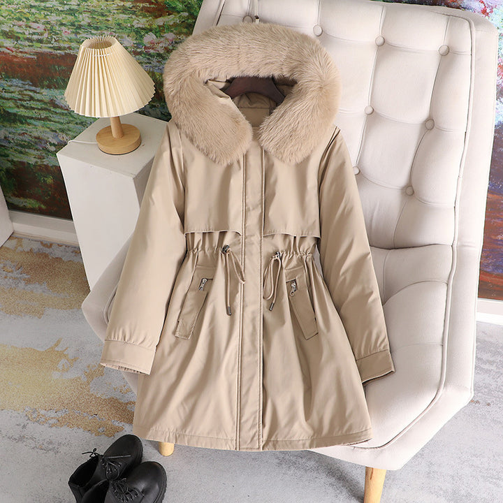 Women's mid-length water-repellent parka with voluminous faux fur collar, waistband drawstring, and multifunctional flap pockets Mune Fashion
