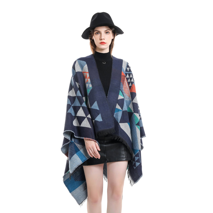 Women's oversized ruana in jacquard wrap style with triangular pattern and fringe hem Mune Fashion