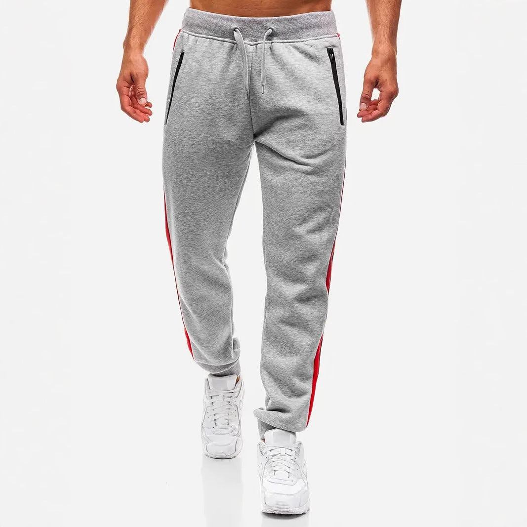 Men's narrow tapered fleece jogging pants with two-tone side piping and water-repellent zip pockets Mune Fashion