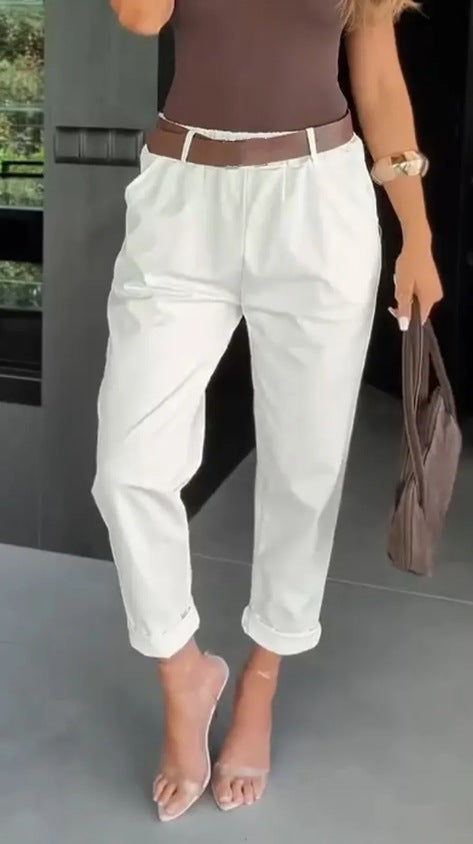Women's high-waisted paperbag pants with gathered waistband, side pockets, and rolled hem Mune Fashion