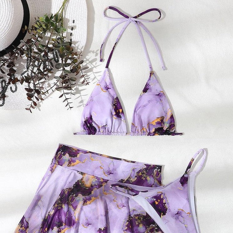 Women's bikini set with creative wrap design and floral skirt Mune Fashion