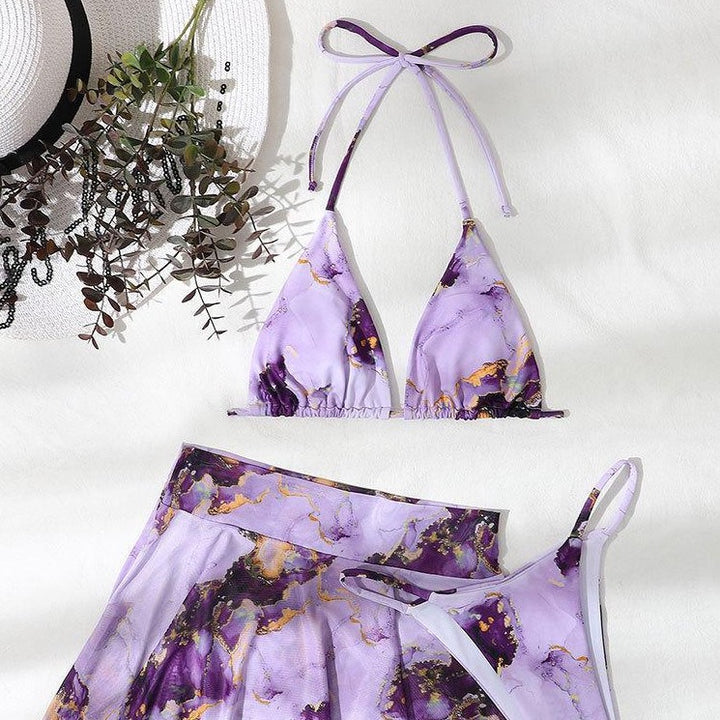 Women's bikini set with creative wrap design and floral skirt Mune Fashion