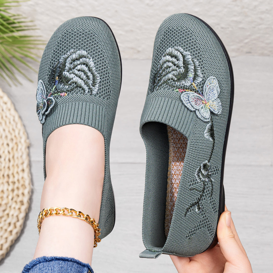 Women's embroidered knitted slipper with sock-like entry, floral embroidery design, and cushioned lightweight sole Mune Fashion