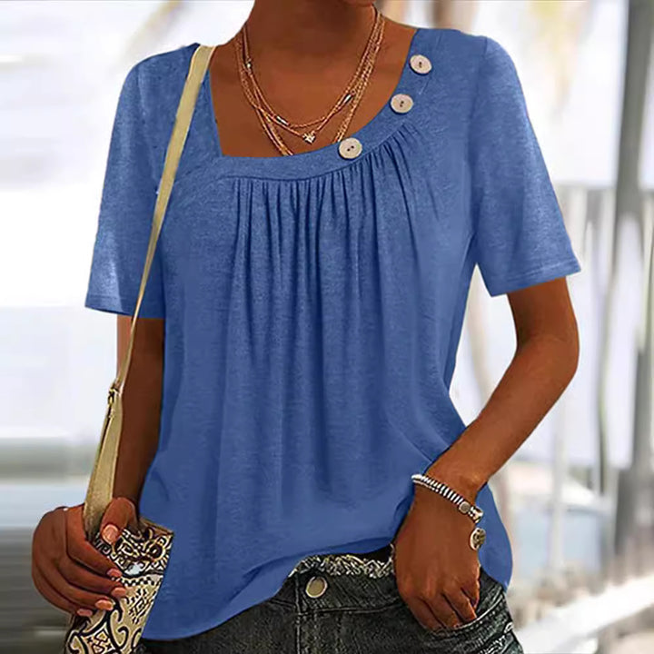 Women's boxy short-sleeve shirt with square neckline, gathered bust area and decorative button detail Mune Fashion
