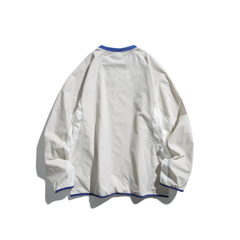 Unisex Lightweight technical oversized sweater with round neckline, zippered pockets, and contrasting finishes Mune Fashion