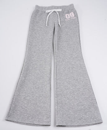 Women's flared high waist lounge pants with elastic comfort waistband, adjustable drawstring, and wide flare Mune Fashion