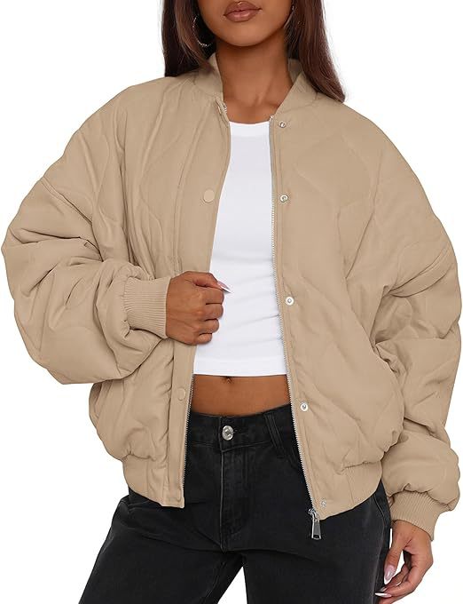 Women's short-cut quilted bomber jacket in oversized look with raglan sleeves Mune Fashion