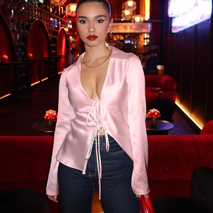 Women's blouse with deep V-neckline and tie ribbons tailored fit flared sleeves Mune Fashion