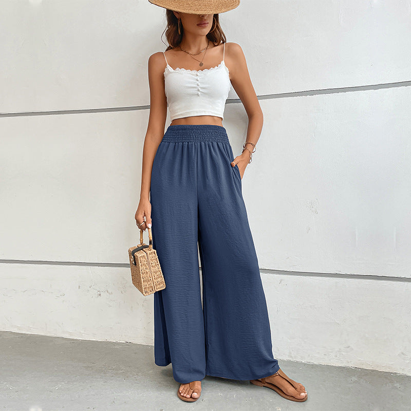 Women's palazzo pants with a high, elastic ruffled waistband and side pockets Mune Fashion