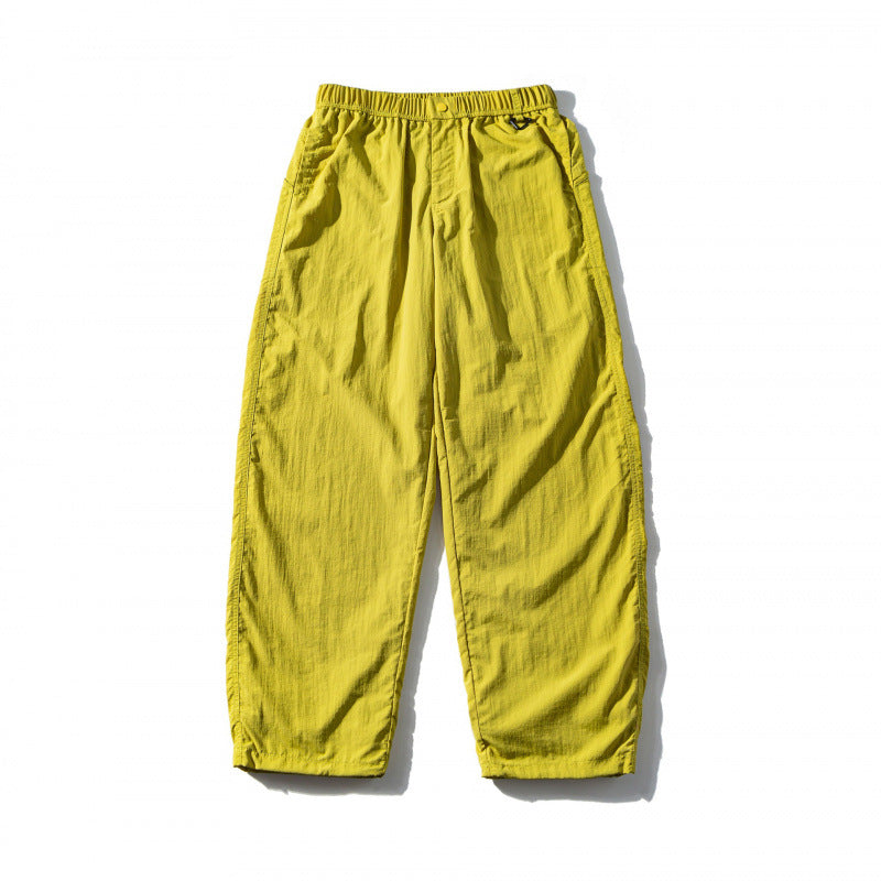 Unisex Loose Crinkle Pants with elastic drawstring waistband, drop-crotch, and side pockets Mune Fashion
