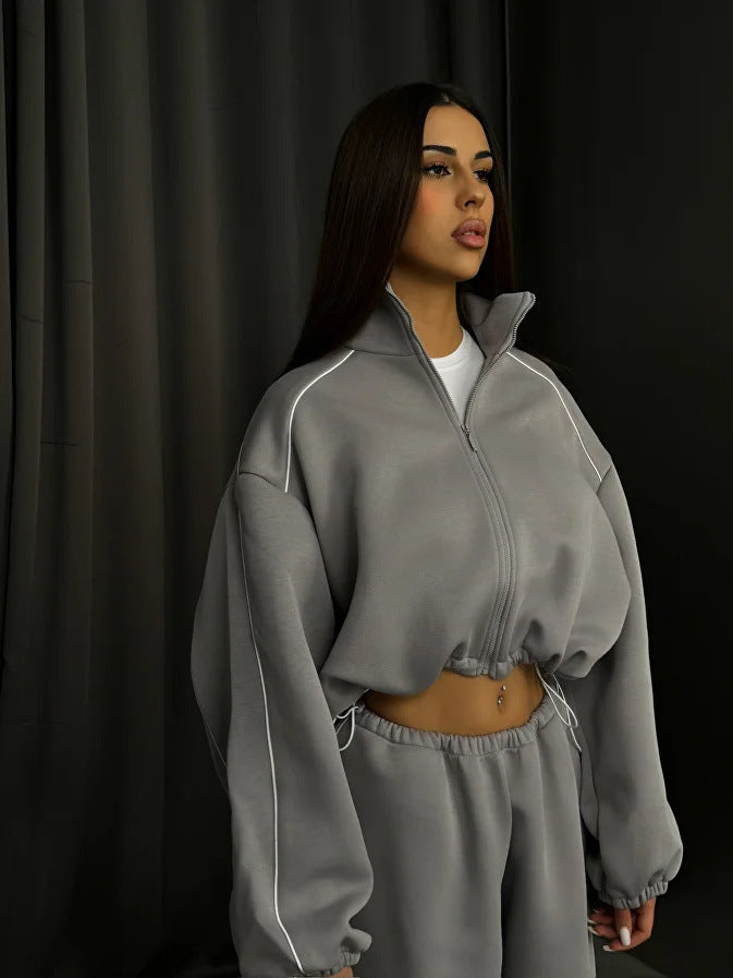 Women's cropped zip hoodie with drawstring waistband, oversized sleeves and contrasting piping Mune Fashion