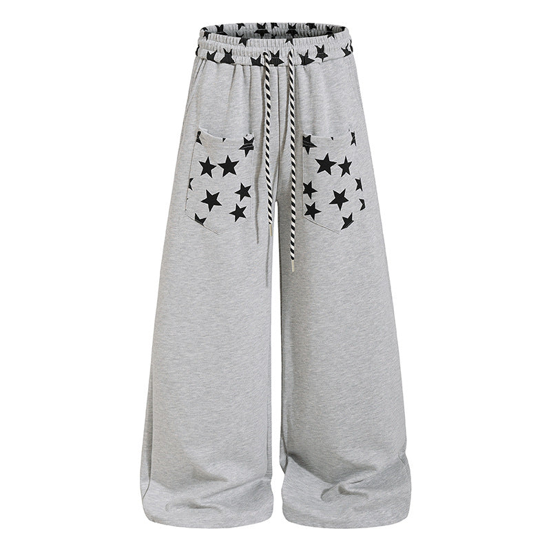Women's extra wide palazzo sweatpants with comfort waistband, drawstring and star appliqué Mune Fashion