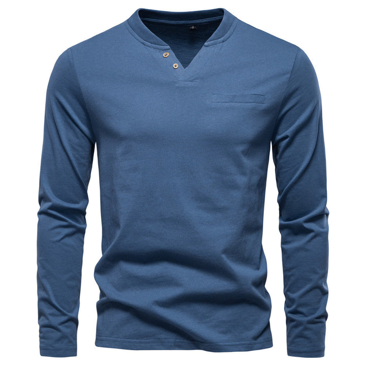 Men's tailored long sleeve shirt in Henley style with short V-neck, decorative buttons, and chest pocket Mune Fashion