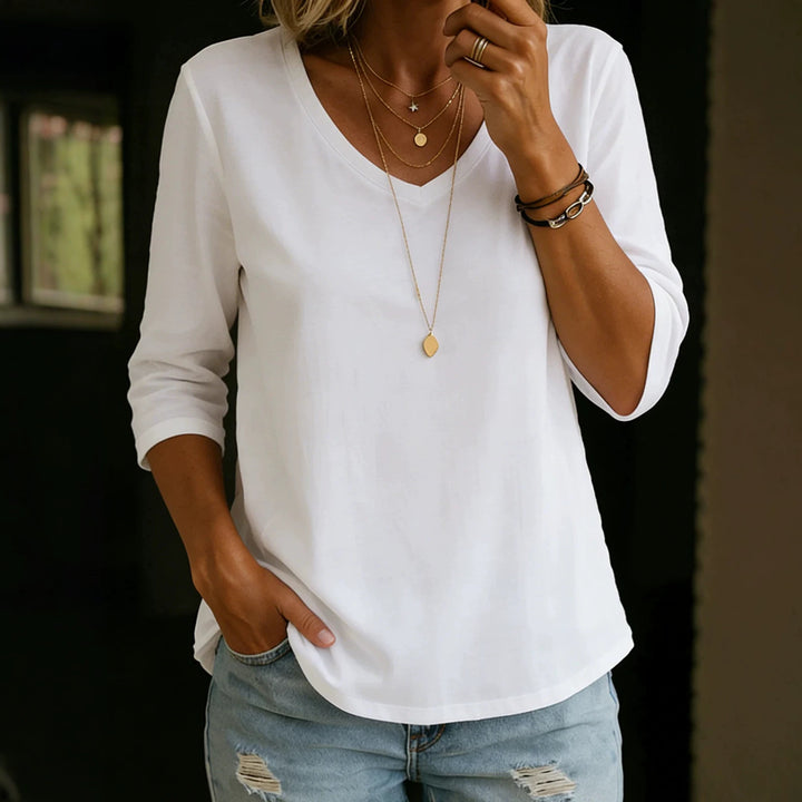 Women's Loose V-Neck Shirt with 3/4 Sleeves and Rounded Hem Mune Fashion
