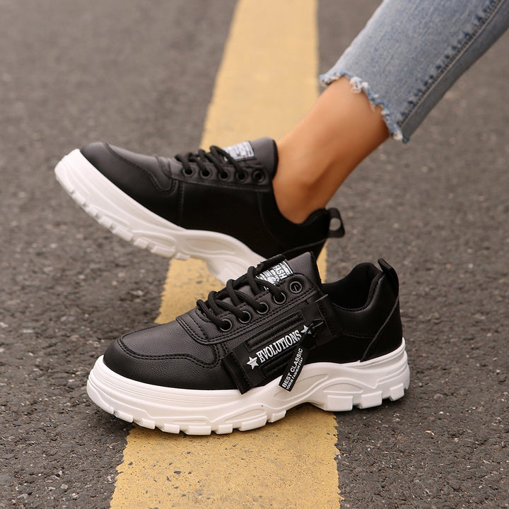 Women's Platform Chunky Sneaker with robust profile sole, zipper detail, and padded comfort footbed Mune Fashion