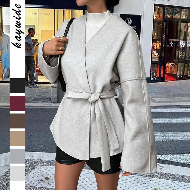 Women’s light wrap coat with tie belt, dropped sleeves and feminine waist emphasis Mune Fashion