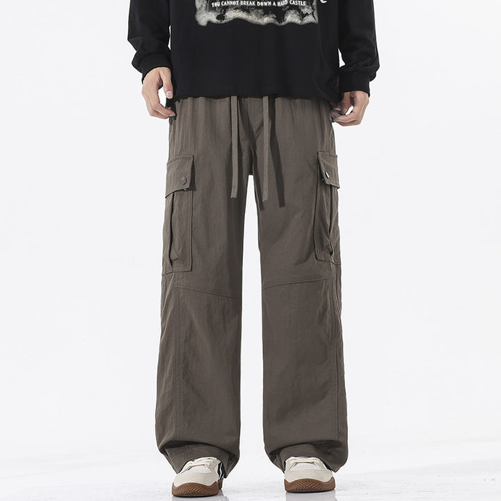 Men's Oversized Cargo Pants in Utility Style with Drawstring Waistband and Large Flap Pockets Mune Fashion
