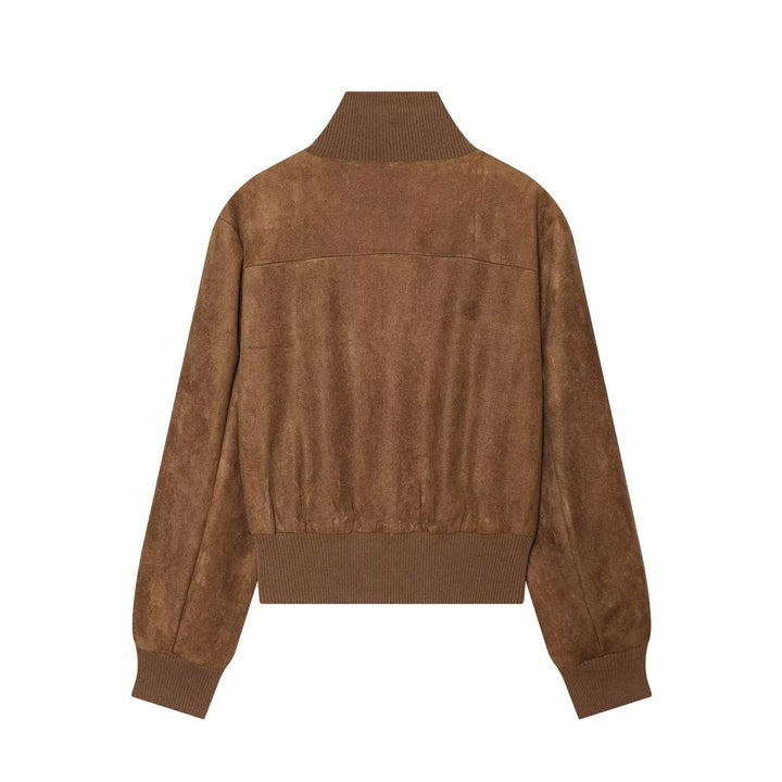 Women's short jacket made of suede leather with high ribbed collar and applied flap pockets.