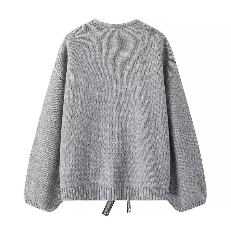 Women nan Oversize knit cardigan with deep V-neck and decorative sequin bows Mune Fashion