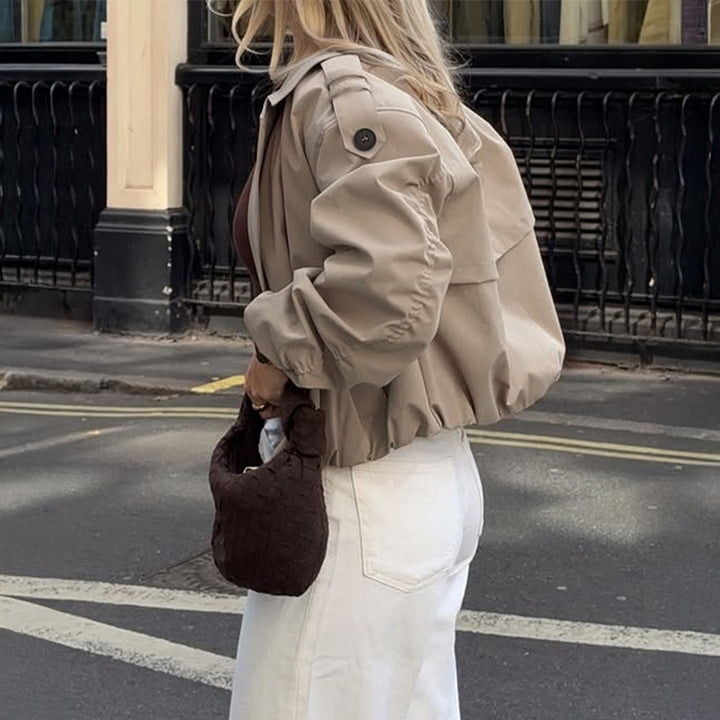 Women's shortened trench coat with double-breasted front, wide lapels, and elastic cuffs Mune Fashion