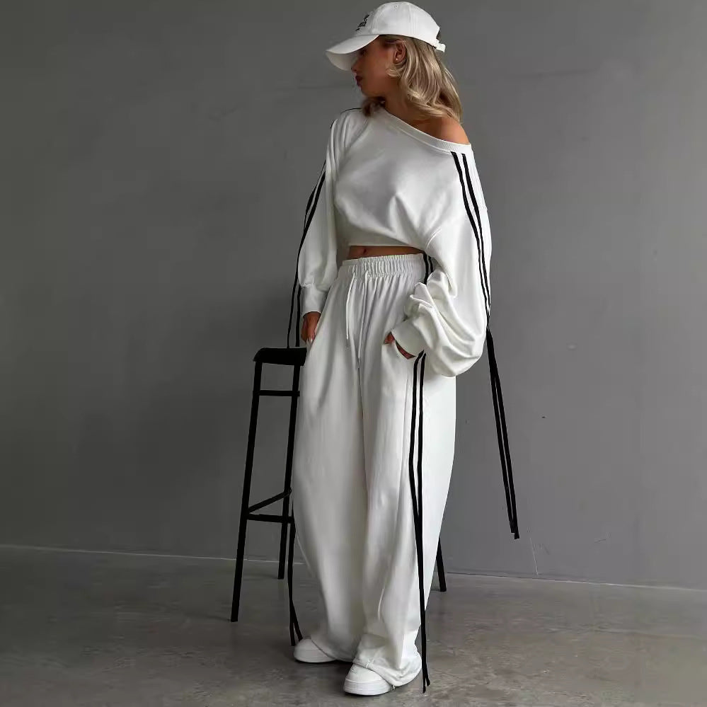 Women's loose Relax leisure pants with drawstring, elastic comfort waistband, and side decorative seams Mune Fashion