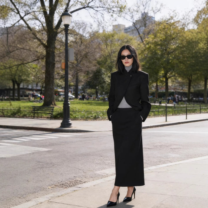 Women's structured short blazer in a minimal style with stand-up collar and concealed button placket Mune Fashion