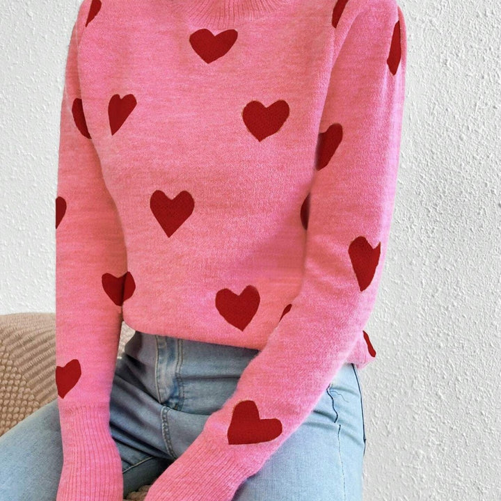Women’s cashmere-like fine knit sweater with all-over heart pattern, round neckline and extended cuffs Mune Fashion