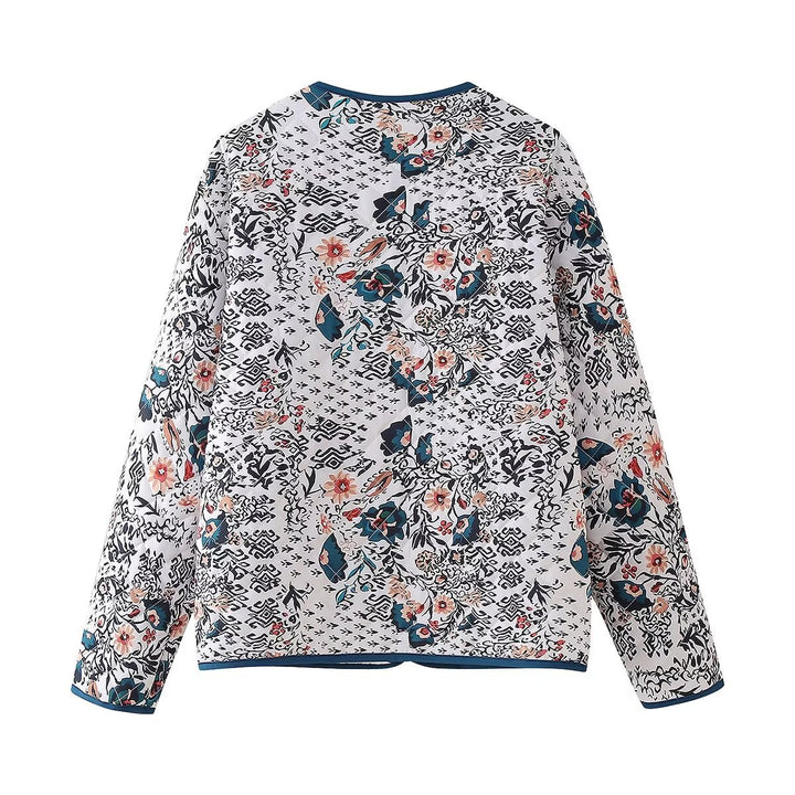 Ladies' quilted blouse jacket with floral-ethnic print, light padding and contrasting piping Mune Fashion