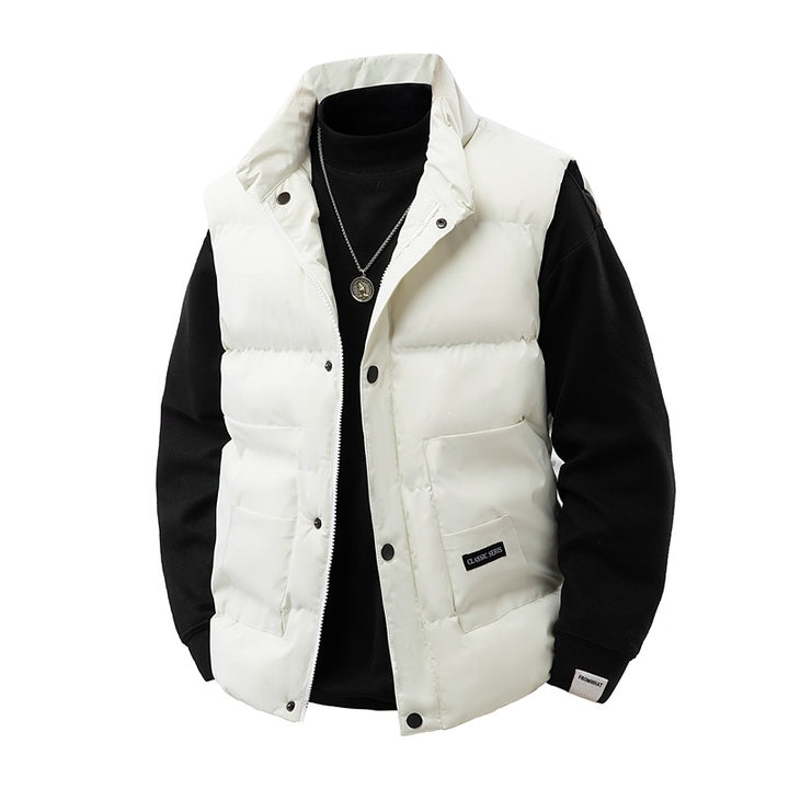 Men's thermo quilted vest with high collar trim, snap button front & mounted utility pockets Mune Fashion