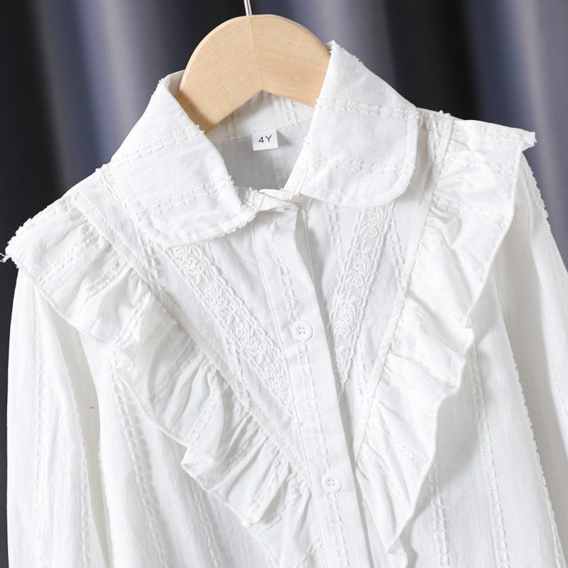 Women’s blouse with ruffle details and fine embroidery Mune Fashion