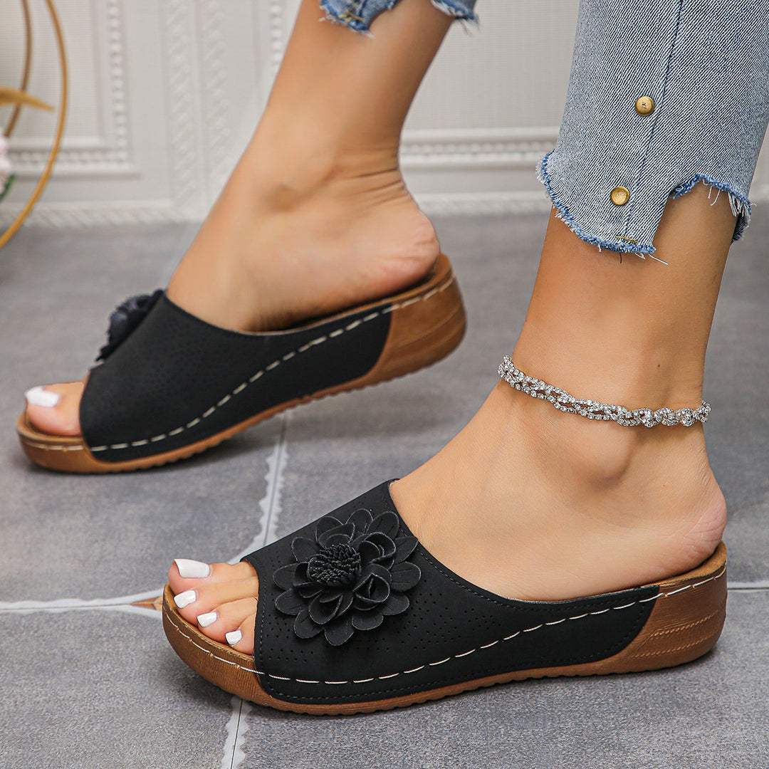 Ladies Padded Peeptoe Mule with Flower Application and Ergonomic Wedge Sole Mune Fashion