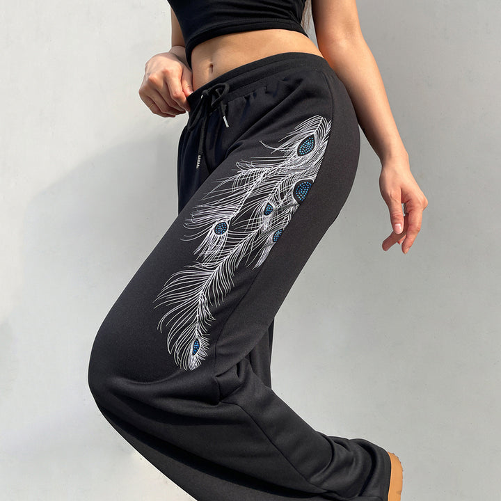 Ladies' wide lounge pants with drawstring, high comfort waistband and peacock feather print Mune Fashion